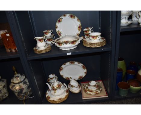 A collection of Royal Albert 'Old Country Roses', comprising tureen, tea pot, plates, cups and saucers, cake stand, gravy boa
