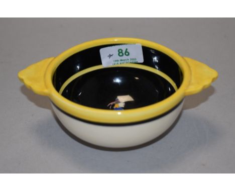 A small vintage Henriot Quimper French Folk Art hand painted ceramic bowl, having two handles.