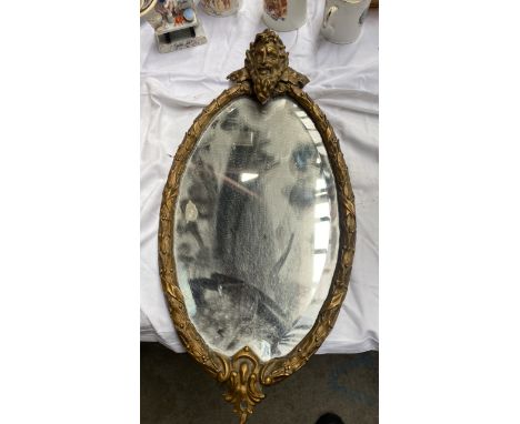  Sale Item:    BRASS OVAL MIRROR WITH HEAD   Vat Status:   No Vat   Buyers Premium:  This lot is subject to a Buyers Premium 