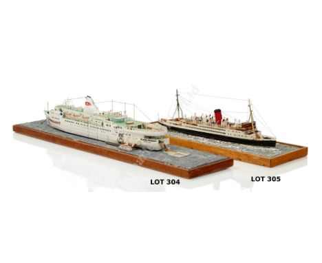 A 1/12IN:1FT SCALE WATERLINE MODEL OF R.M.S. LADY OF MANN  modelled by M. Fidgeon with laminated and carved hull, fitted as a