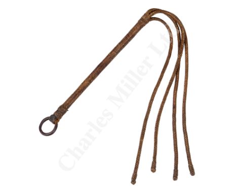 A 19TH CENTURY FLOG/FLAY, constructed of woven leather over an iron core with four tails with knotted ends and iron suspensio