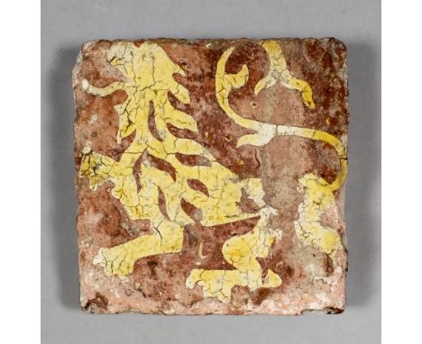 A Medieval encaustic tile decorated with a white slip inlay of a roaring lion, 4.25ins square ( possibly French, 15th Century