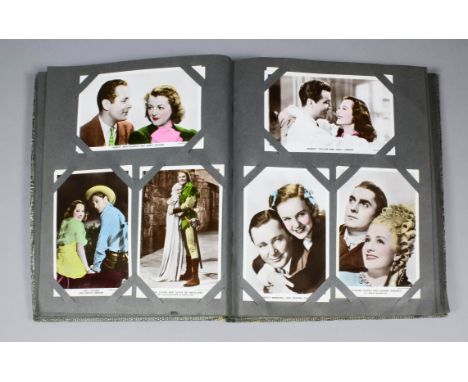 A postcard album containing a collection of postcards of film stars, including - George Raft, Greta Garbo, Ronald Coleman and