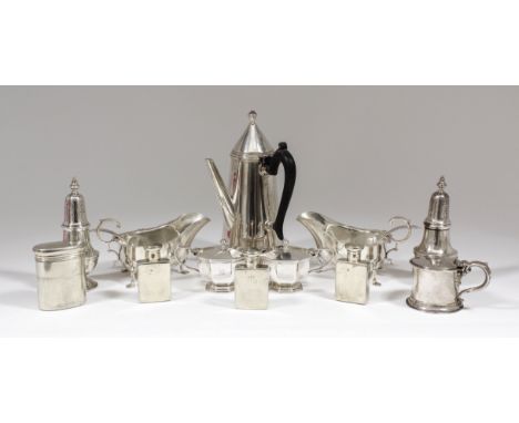 A George V plain silver side handled coffee pot, the conical cover with turned finial and with plain tapered body, 8.75ins hi