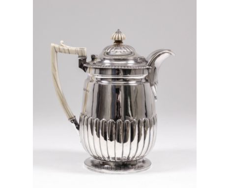 A George III silver coffee biggin, the slight baluster shaped body with bold reeded base, the domed cover with French gadroon