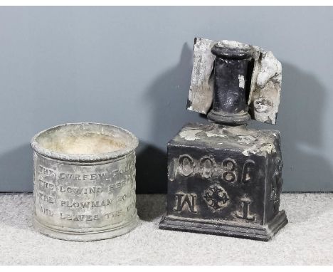 A cast lead circular planter, cast in relief with verse to sides, 11ins diameter x 9ins high, and a George III lead drainage 