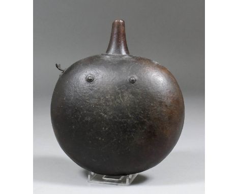 A 17th/18th Century leather powder flask of "Bun" shape, with mahogany spout and iron measure, 7.5ins long