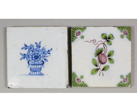An 18th Century English blue and white Delft tile with a flower vase, and a manganese and green tile with a strawberry patter