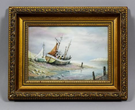 A Royal Worcester bone china plaque painted by M.Powell with two beached fishing boats, 5ins x 7ins, signed, in gilt moulded 