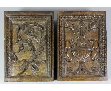 Four 16th Century walnut blocks carved with beasts - one with foliage sprouting from its mouth, a two-handled vase and flower