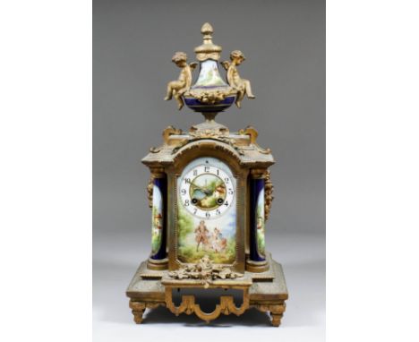 A late 19th Century French gilt spelter and porcelain mounted mantel clock, the porcelain dial with 3.25ins diameter chapter 