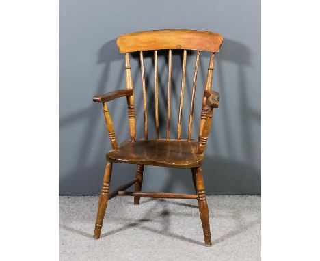 A 19th Century beechwood and elm seated stick back Windsor armchair on turned underframe, stamped "BEW" to seat rail (reduced