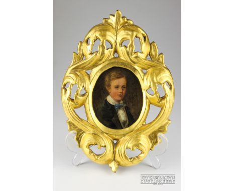 English School - Portrait of a young boy with blue bow tie, oil on board, oval, 11.7cm max in a ornate carved wooden gilded g