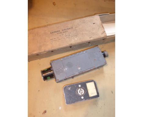 AIRCRAFT CAMERA IN BOX 'AIRCRAFT TYPE G45B' AS USED IN SPITFIRES AND HURRICANES, TOGETHER WITH AN AIR MINISTRY CASSETTE FILM