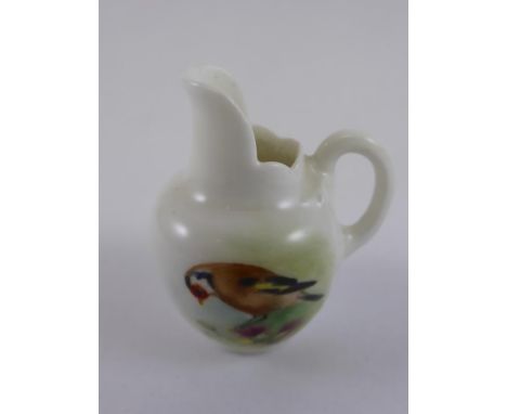 WORCESTER MINIATURE FLAT BACK JUG WITH BIRD DECORATION, SIGNED