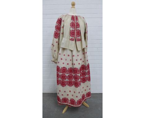 Vintage Eastern European costume, embroidered in red and blue, comprising skirt, blouse, apron and cap (4)