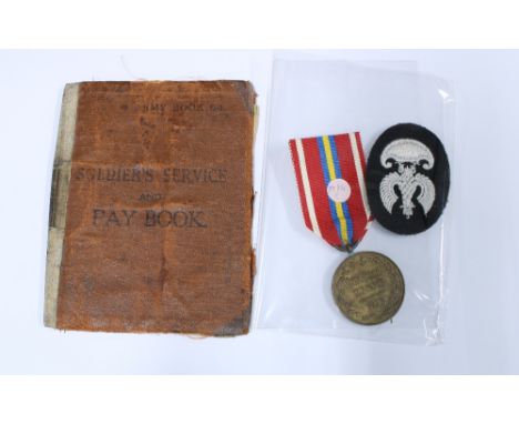 Soldier's Service and Pay Book, Polish Army felt badge and 1938 medal (3) 