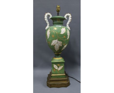 Large sage green and white bisque pottery table lamp base, of classical form with gilt highlights, on a gilded metal base, 61