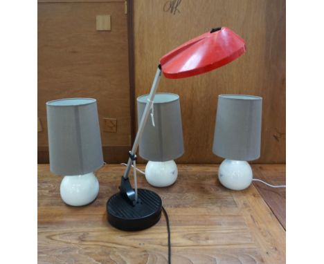 RED ANGLEPOISE DESK LAMP
with weighted base and red shade along with three white globe table lamps 