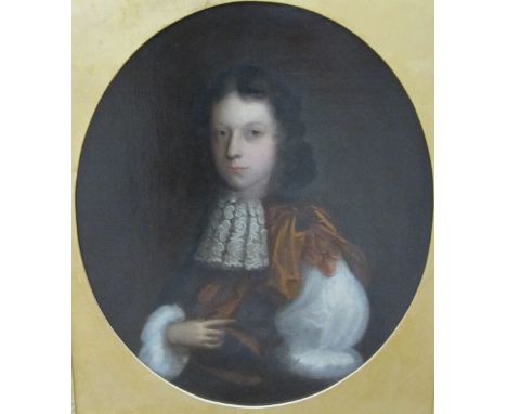 FOLLOWER OF CHARLES D'AGAR (1669-1723)Portrait of a young Manwearing lace shirt and brown cloak and white jabotpainted ovaloi