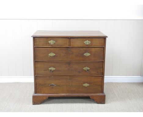 An 18th Century fruitwood and elm Chest of Drawers with satinwood stringing fitted two short and three long graduated drawers