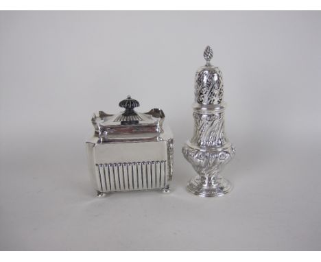 A Victorian silver Tea Caddy of oblong semi-fluted form on ball feet, Sheffield 1885 and a Sugar Caster scroll embossed, Lond