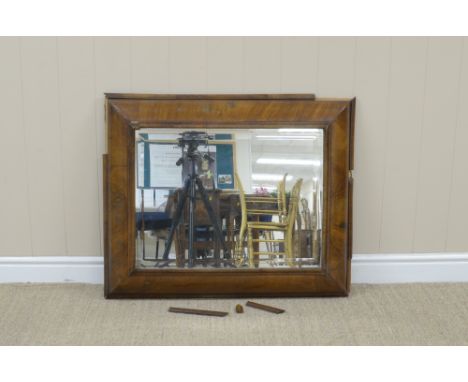 An 18th Century walnut cushion framed Wall Mirror of rectangular form with bevelled plate, 2ft 8in x 2ft 2in