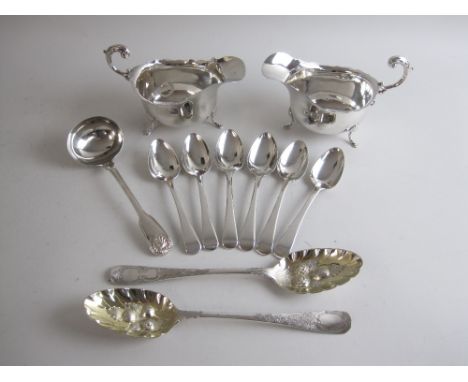 A pair of George III silver Berry Spoons with fruit embossed bowls, London 1791, six George IV Teaspoons, London 1823, Sauce 