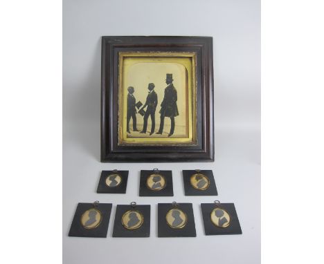 ENGLISH SCHOOL, MID 19TH CENTURYPortrait Silhouette of three Figures, all members of the McBarnet Family, standing, an extens