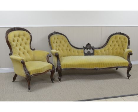 A Victorian spoon back Settee with yellow dralon button upholstery on scroll carved cabriole supports, and a similar Occasion