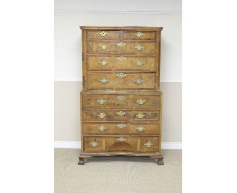 An 18th Century walnut Secretaire Chest on Chest fitted two short and six long drawers with feather and cross-banding, canted