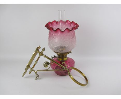 A Victorian brass mounted Paraffin Lamp with etched shade