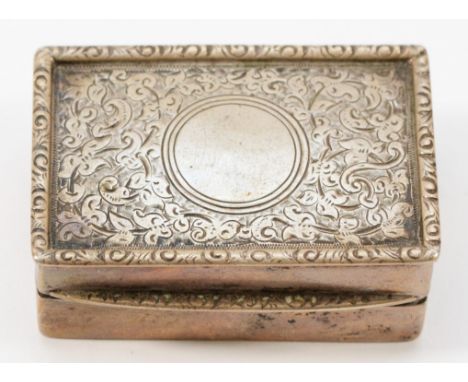 An Edwardian silver pill box, by Walker &amp; Hall, Birmingham 1906, with floral engraved cover, 5 x 3.5 x 2cm, 40gm