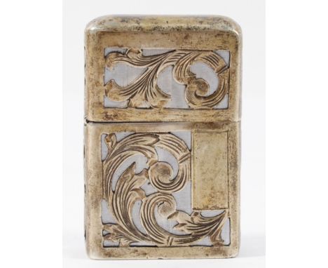 A Mexican sterling silver Zippo style petrol lighter with Aztec motif to the front.