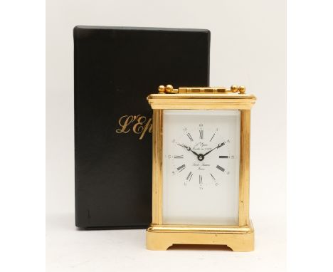 L'Epee; A 20th Century French brass cased carriage timepiece, with a white enamel dial, signed 'L'Epee. fonee en 1839. Saint 