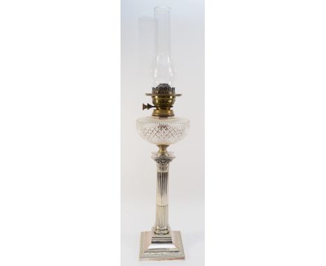 A late 19/early 20th century electroplated oil lamp, by Hawksworth, Eyre & Co., the cut glass bowl with Duplex wicks and glas
