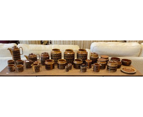 A collection of twenty eight Hornsea Heirloom pattern pottery pieces, circa mid 20th century, to include storage jars, spice 