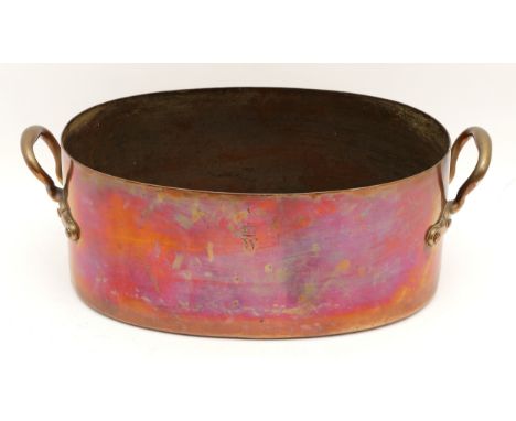 A large 19th Century copper preserve pan or stock pot, having riveted brass handles and engraved with a monogram of a W toppe