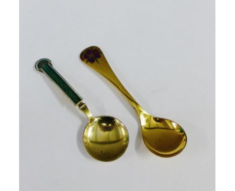 Georg Jensen silver gilt and enamel 1974 year spoon and a Scandinavian silver gilt and enamel spoon (2) 
