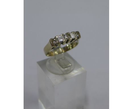 An 18 carat white gold five stone diamond ring, UK ring size K