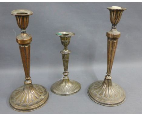 An Adams style candlestick, together with a pair of old Sheffield plate candlesticks, tallest 30cm,  (one a/f), (3) 