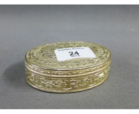 Silver trinket box and cover of oval form , with foliate repousee pattern, 9.5cm 