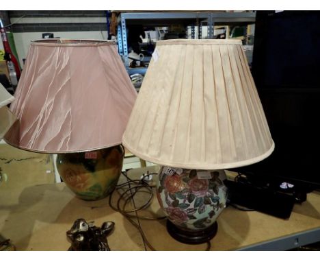 Three table lamps, Two with floral design. All electrical items in this lot have been PAT tested for safety and have passed. 