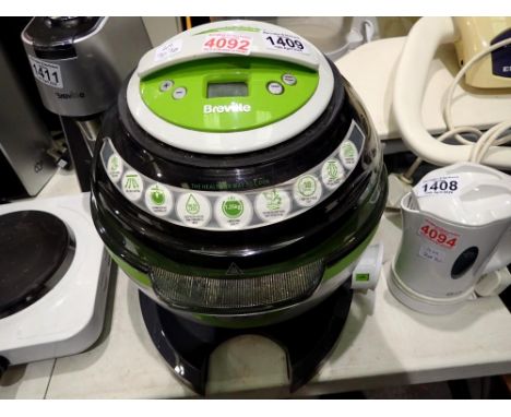 Breville Halo 1.25kg halogen cooker. All electrical items in this lot have been PAT tested for safety and have passed. This d