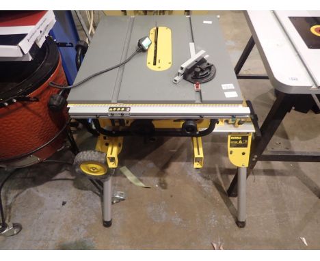 DeWalt DW745-GB table saw on DE7400 table saw stand. All electrical items in this lot have been PAT tested for safety and hav