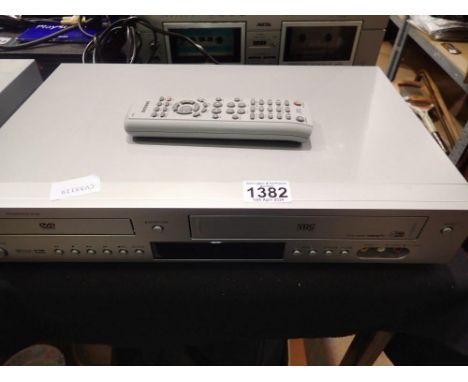 Samsung progressive scan DVD and VHS player with remote. All electrical items in this lot have been PAT tested for safety and