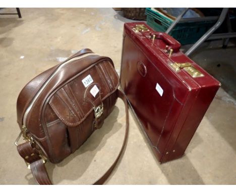 TSS leather bound briefcase and a leather locking bag. Not available for in-house P&amp;P 