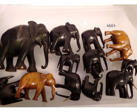 Collection of carved wooden elephants. UK P&amp;P Group 2 (£20+VAT for the first lot and £4+VAT for subsequent lots) 