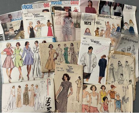 A collection of vintage dress patterns, circa 1960s-1980s, Vogue, Butterick, and Style.