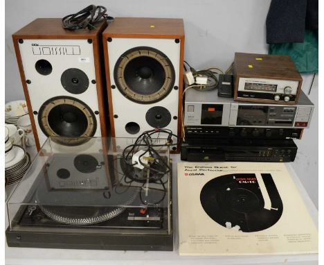 A selection of home stereo equipment, including: an Akai stereo cassette deck, Model HX-A3; a Marantz compact disk player CD-